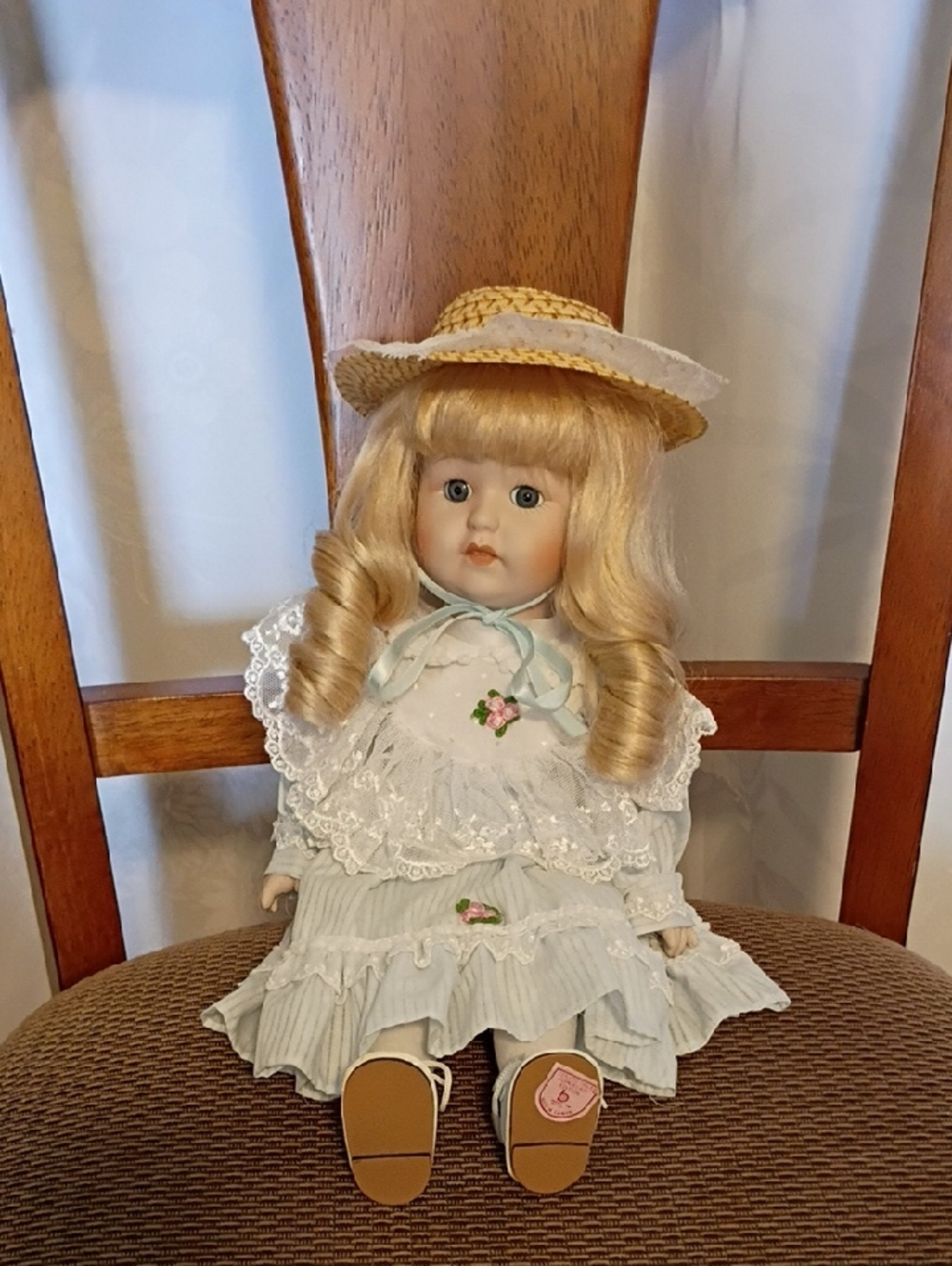 Blonde Porcelain Doll in Lace Dress with Straw Hat